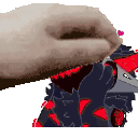 a close up of a person 's hand holding a cartoon character 's head .