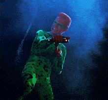 a person in a green costume with a question mark on the back