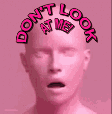 a man 's head with the words do n't look at me written on it