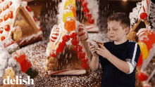 Mini Ginger Bread House Food GIF - Mini Ginger Bread House Food Thumbs Up GIFs