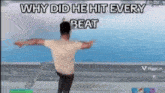 a man is standing with his arms outstretched in front of a wall that says why did he hit every beat