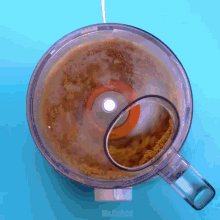 a food processor with the word mr.cakes written on the bottom