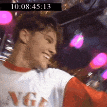 a close up of a man wearing a shirt that says angels