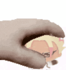 a pixel art of a hand holding a cartoon character 's face .