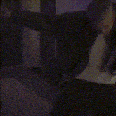 a blurry picture of a living room with a picture on the wall that says " akira "
