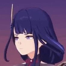 a close up of a person 's face with a sword in their hair .