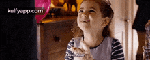 a little girl is holding a cat and saying `` i love him ! ''