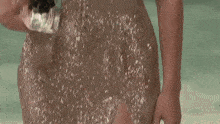 a close up of a woman 's chest in a sequined dress