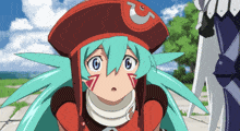 a girl with green hair and a red hat has the letter g on her hat