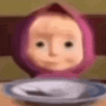 a cartoon character is sitting on a plate with a spoon in it .