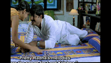a man and woman are laying on a bed with the words " pretty radha 's melodies " on the bottom right
