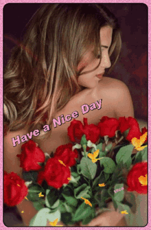 a woman holding a bouquet of red roses with the words have a nice day