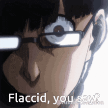 a close up of a person wearing glasses and headphones with the words flaccid you say