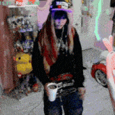 a person holding a cup of coffee in front of a shelf with toys on it and the time 11:11