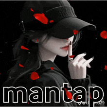 a girl in a baseball cap is holding a red rose in front of her face and the word mantas is on the bottom right