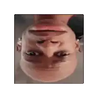 a close up of a person 's head with a funny face .