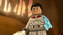 a lego figure with a glowing arm and a sword in his hand