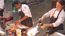 Blowtorch Top Chef GIF - Blowtorch Top Chef Setting It On Fire GIFs