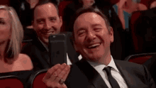 kevin spacey emmys phone laugh