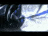 a blurry image of a person 's face with a blue light coming out of their eyes