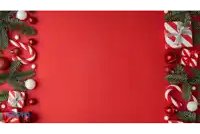 a red background with christmas decorations and gifts