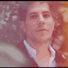 a close up of a man 's face with the words mafia rbdgif below