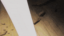 a cartoon drawing of a wooden wall with a white beam coming through it