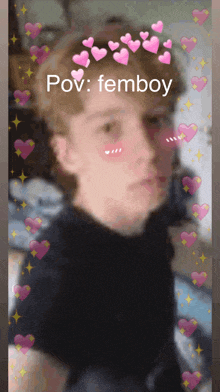 a picture of a boy with hearts on his face and the words pov femboy on the bottom