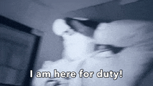 a blurry photo of a person laying on a bed with the words `` i am here for duty '' .