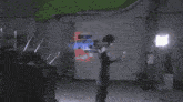 a person 's feet are visible in a dark room
