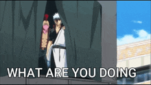 two anime characters are standing in a dark room with the words " what are you doing " below them