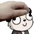 a hand is putting a donut on the head of a cartoon character .