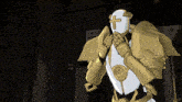 a robot with a cross on it 's face
