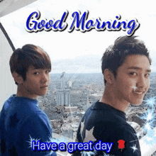 two young men are standing next to each other in front of a city skyline .