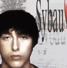 a picture of a young man with sybau written on the bottom right