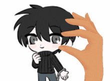 a hand is holding up a small cartoon character with black hair