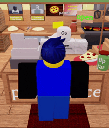 a person in a blue shirt stands in front of a counter with a sign that says open