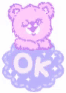 a pink teddy bear is sitting on top of a purple cloud with the word ok on it .