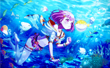 a girl in a bikini is swimming in the ocean