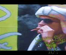 a painting of a man smoking a cigarette with swagger boy written on the bottom right