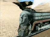 a man 's head is on the front of a train