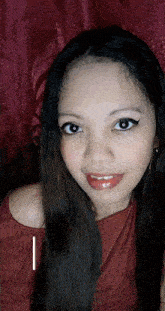 a close up of a woman 's face with the letter i in the corner