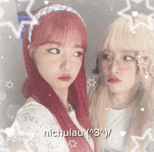 a girl with red hair is next to another girl with blonde hair and nichulau written on the bottom