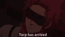 a man with red hair is wearing a mask and the words tarp has arrived