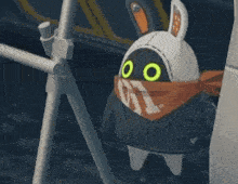 a cartoon character wearing a mask with the letter c on it