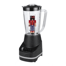 a blender with a pixelated image of a man inside of it