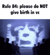 a group of people looking at a screen that says rule 84 please do not give birth in ve