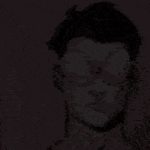 a close up of a person 's face with their eyes closed