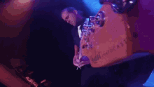 a man is playing a drum set that says new castle