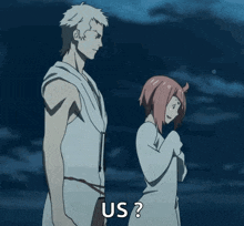 a man and a woman standing next to each other with us written on the bottom right
